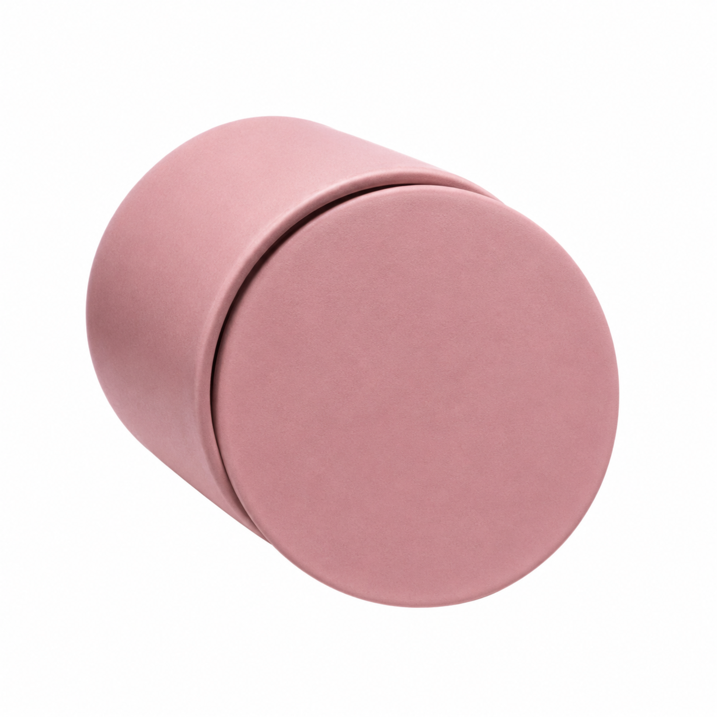 Blush Pink ceramic keepsake urn shown on its side highlighting the smooth matte finish and secure lid