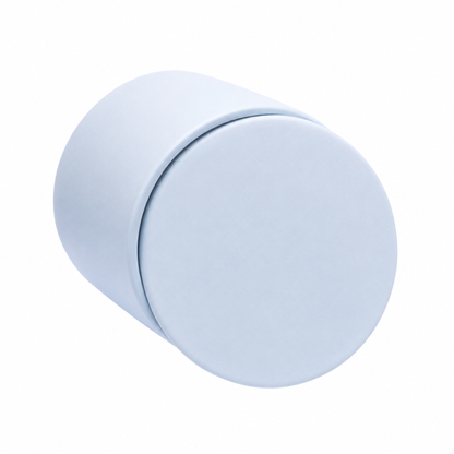 Light Blue ceramic keepsake urn shown on its side highlighting the smooth matte finish and secure lid