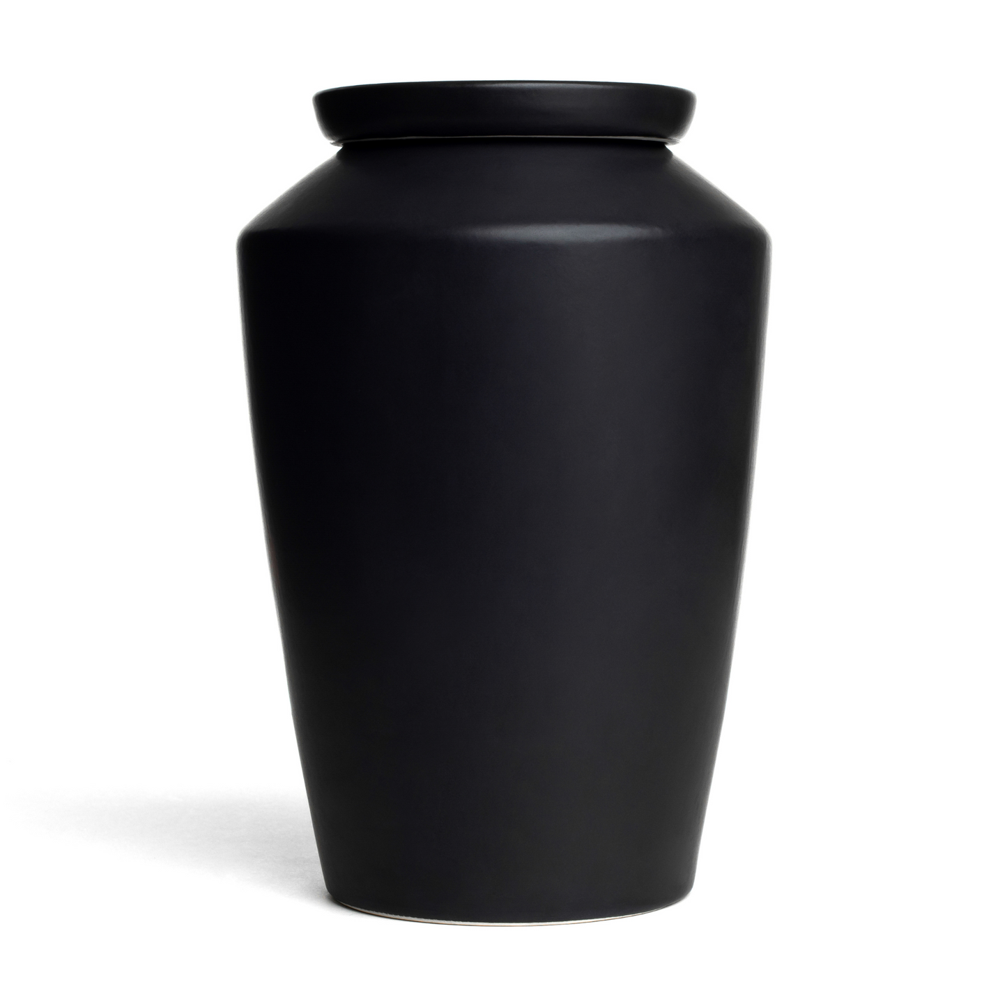 Handmade matte black ceramic cremation urn for adult ashes, minimalist modern memorial vessel for home decor.