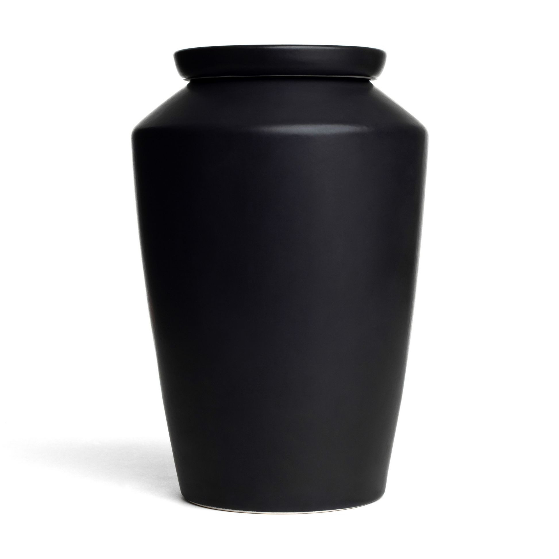 Handmade matte black ceramic cremation urn for adult ashes, minimalist modern memorial vessel for home decor.