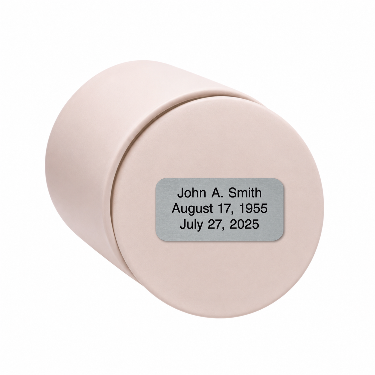 Soft Pink ceramic keepsake urn shown on its side with optional personalized memorial engraving plate