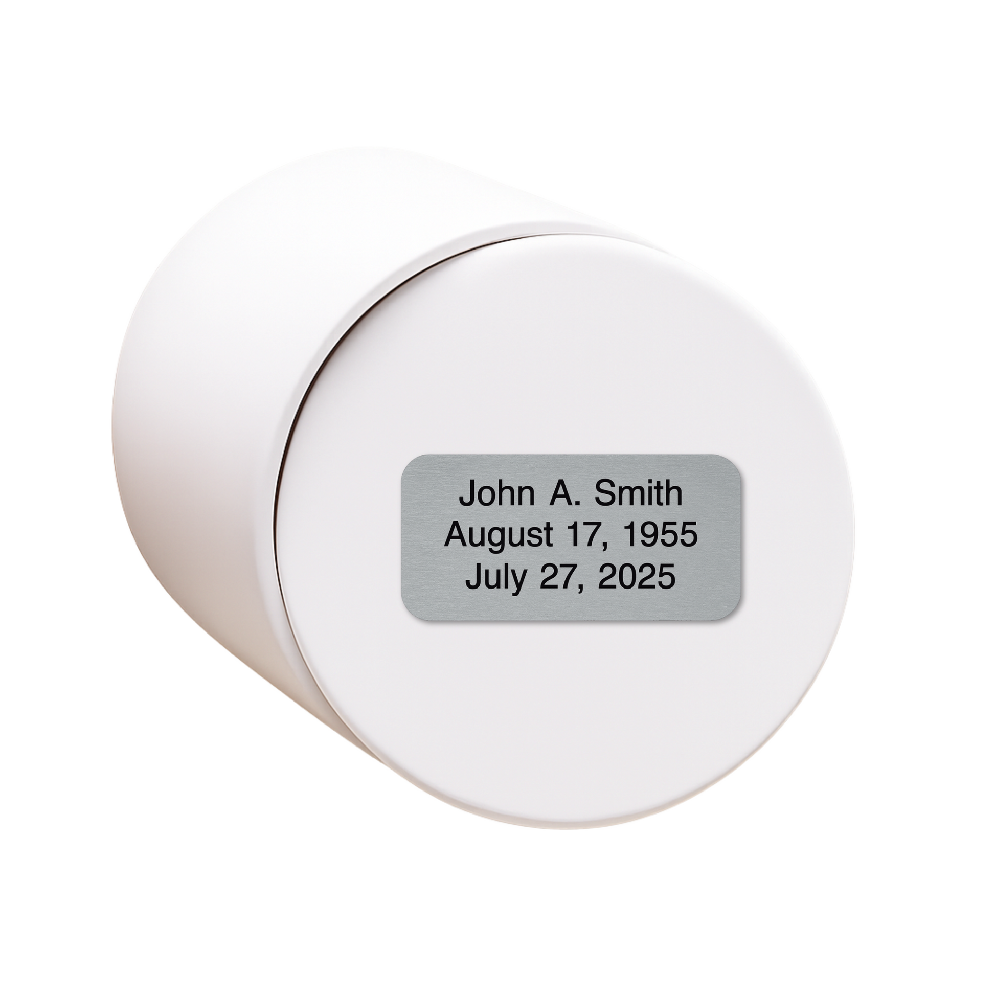 White ceramic keepsake urn shown on its side with optional personalized memorial engraving plate